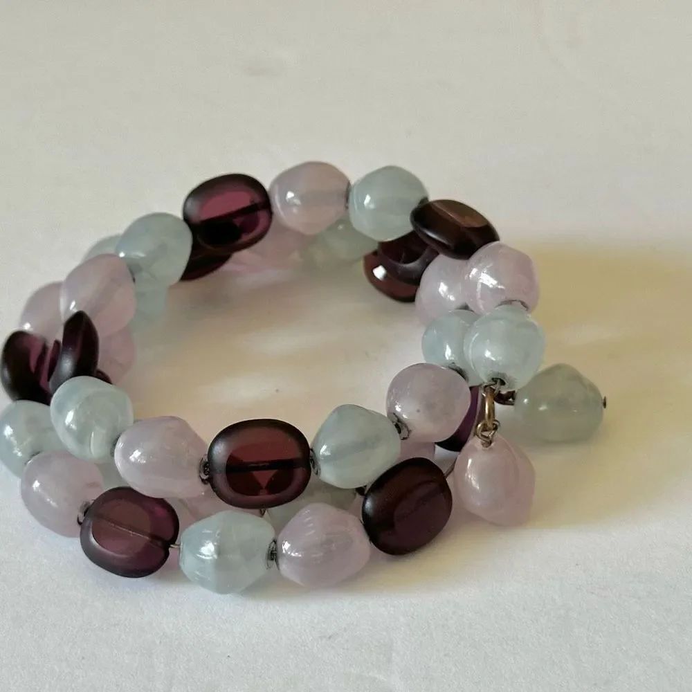 Green pink and purple wire triple strand bracelet